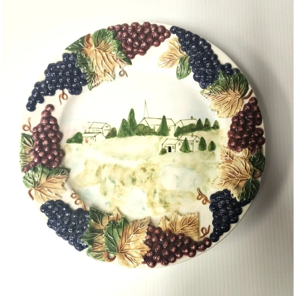 World Market Decorative Plate raised grapes and leaves around a‎ country scene